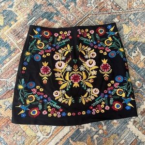 Gorgeous Umgee black skirt with floral embroider. Never worn.